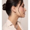 Irregular hoop earrings in sterling silver